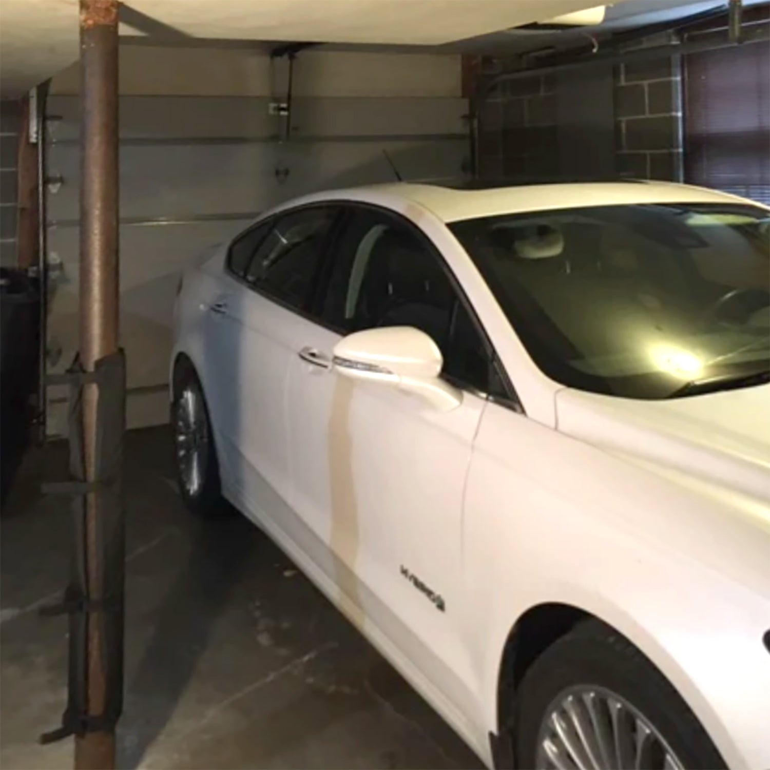 Black Padding for garage poles. Garage pole pad that secures to your garage pole to prevent dings and dents on your car door.