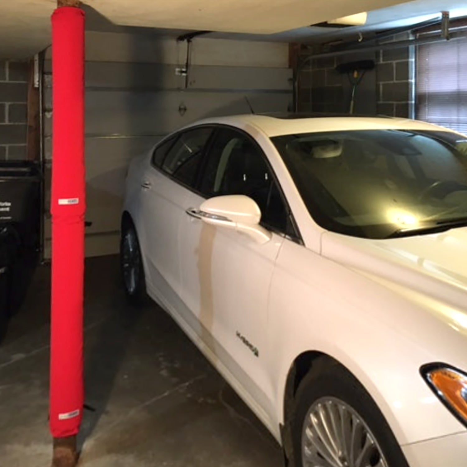 Padding for garage poles. Garage pole pad that secures to your garage pole to prevent dings and dents on your car door - 2 stacked on a pole
